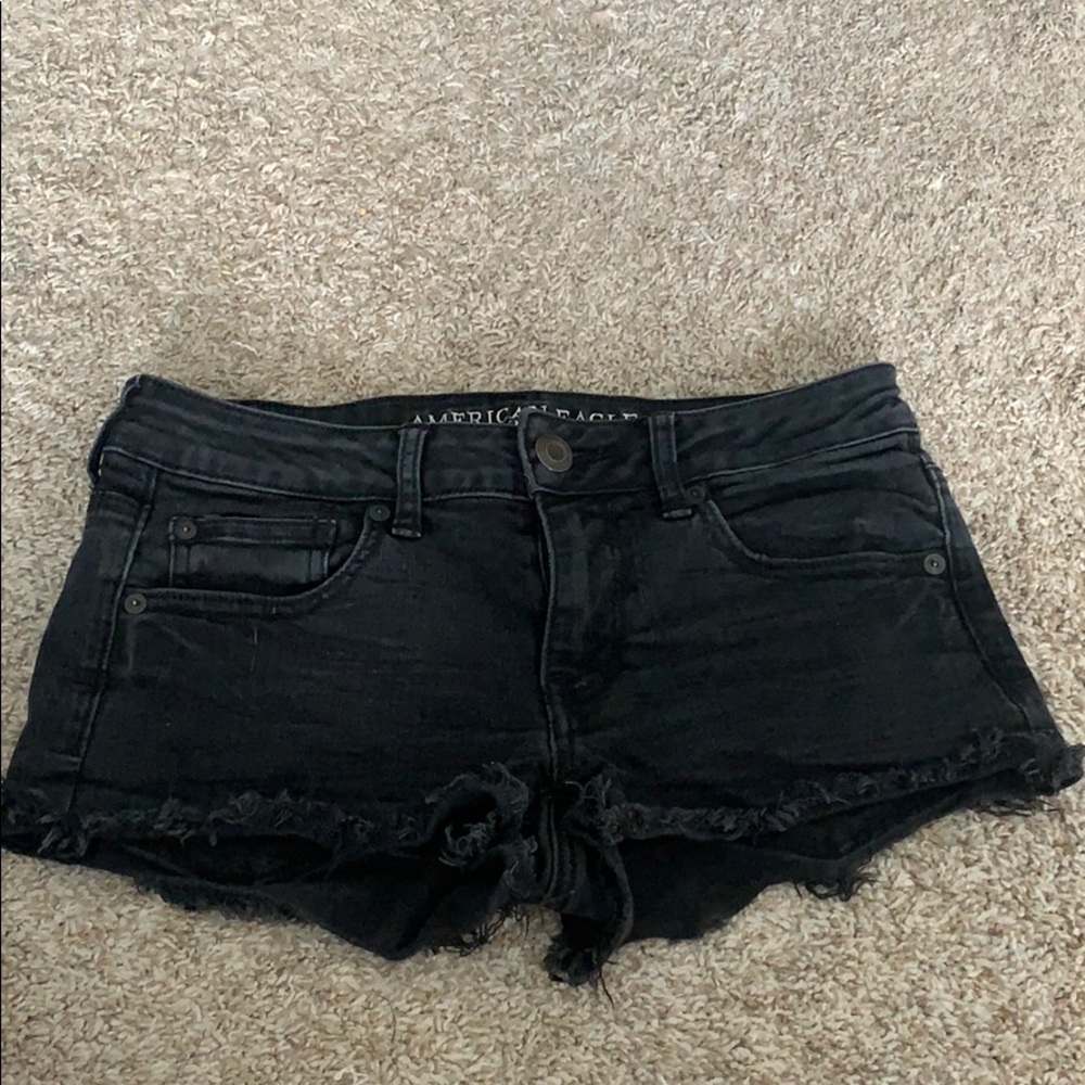 AMERICAN EAGLE distressed black denim shorts